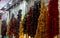 Chains of dried fruit at market stall