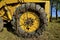 Chains on huge tire of an excavating machine