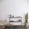 Chair  coffee table  shelf and cactus in front of the white wall  empty wall mockup