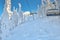Chair lift in Poiana Brasov ski resort, Skiers and snowboarders enjoy the ski slopes in Poiana Brasov winter resort whit forest