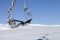 Chair-lift in ski resort at sun day after snowfall