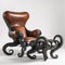 A chair and ottoman with octopus legs on a white background, AI