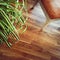 Chair and plant on wooden floor