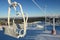 Chair ski lift covered with snow