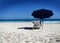 Chair and umbrella on beach