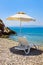 Chair and umbrella at greek beach