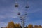 Chairlift without people. The cable car on the blue sky in the Dolomites.