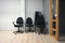 Chairs arranged in stack in new office