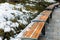 Chairs covered with snow