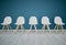 Chairs, line and waiting room in the office corridor for an interview, meeting or recruitment. Seats, row and empty