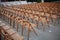 chairs on the roof. Concert hall. many wood chairs