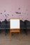 Chairs in a row are in the conference room theme music, flipchart Board