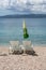 Chairs and sunny umbrella on the beach