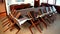 Chairs and table dining area on yacht passenger boat ship vessel.