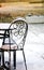 Chairs and table in outdoors caffe on snowy cold night