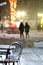 Chairs and table in outdoors caffe on snowy cold night