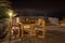 Chairs and table on the terrace overlooking the Bay of Naples and Vesuvius. Sorrento.