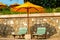 Chairs and umbrella on stunning tropical beach