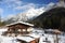 Chalet in French Alps in Chamonix with a panorama of mountains covered in snow in winter