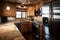 chalet kitchen, with view of the modern and sleek appliances, granite countertops and custom cabinetry