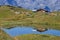 A chalet on the shore of lake Besson on Plateau des Petites Rousses welcomes hikers and