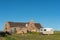 Chalet, toilet facilities and a caravan at Matjiesfontein farm