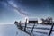 Chalets in the mountains at night under the stars.