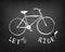 Chalk bicycle with text: let\'s ride!