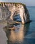 Chalk cliffs of Etretat with the natural arch called Manneporte