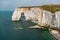 Chalk cliffs of Etretat with the natural arch called Manneporte