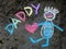 Chalk drawing: Cute father portrait and word DADDY