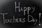 Chalk inscription, happy teacher\'s day on black Board