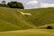 Chalk white horse on a hillside in Wiltshire, UK.