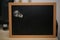 Chalkboard with bulb, symbolic of Ideas