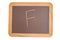 Chalkboard with an F written on it