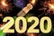 Chalkboard with four leaf clover and chimney sweeper and sparklers with happy new year 2020