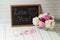 Chalkboard with inscription Love You and peonies