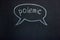 Chalkboard inscription `polemic` with marked space