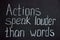 Chalkboard lettering `Action speak louder than words`
