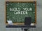 Chalkboard on the Office Wall with Build Your Career Concept. 3D.