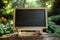 Chalkboard in outdoor setting table with stand in garden