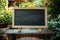 Chalkboard in outdoor setting table with stand in garden