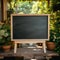 Chalkboard in outdoor setting table with stand in garden