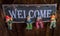 Chalkboard sign board with text welcome come in