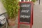 Chalkboard sign with today\'s lunch and diner