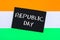 A chalkboard with the text Republic Day written in it and a flag of India.