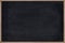 Chalkboard wood frame with black surface.