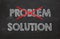 Chalkboard with words Problem and Solution`.