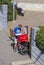 Chalkida, Evia Island. July 2019: Greek mail Courier ELTA on a motorcycle with documents on the main street of the city