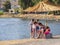Chalkida, Evia island. July 2019: Panoramic view of the city beach of Liani Ammos with tourists and Gypsies children